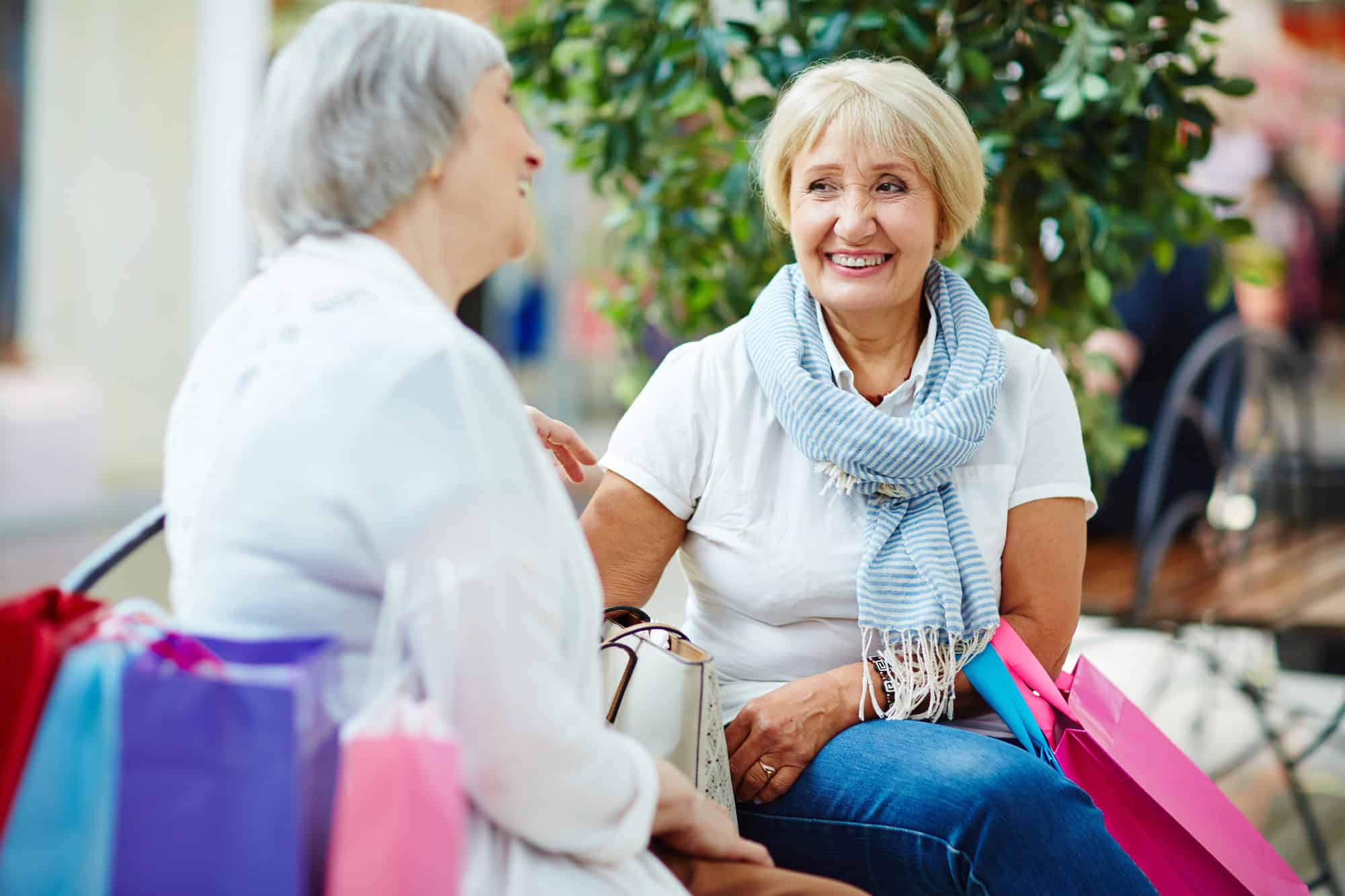 Woman enjoying senior discounts on shopping in Longmont, Colorado