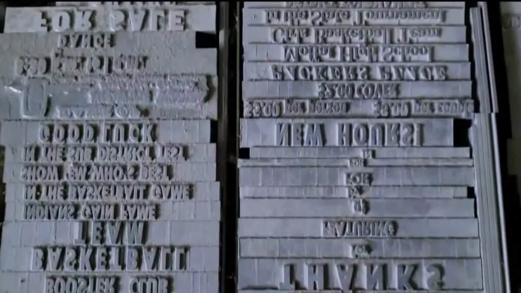 Close view of a metal plate labeled Linotype model information